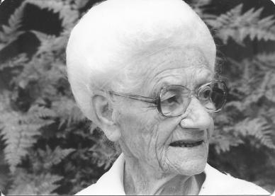 Mamie, possibly thinking about hitting someone with her cane.